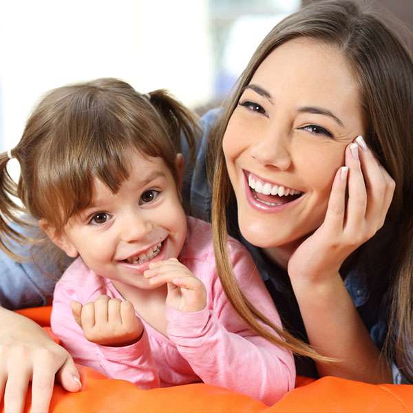 Parent and child laughing